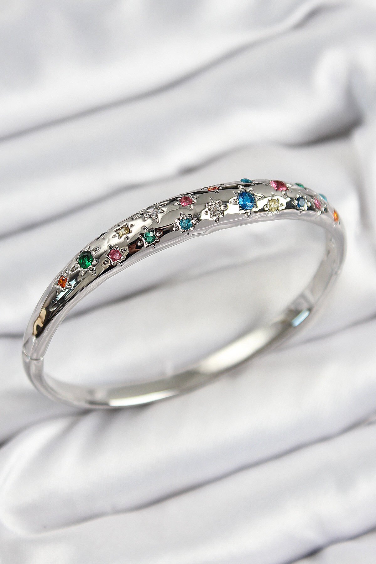 Pirinç Renkli Zirkon Taşlı Kutup Yıldızı Model Gümüş Renk Kadın Kelepçe