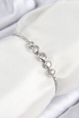 Pirinç Zirkon Taşlı Sıralı Daire Model Gümüş Renk Asansörlü Kadın Bileklik